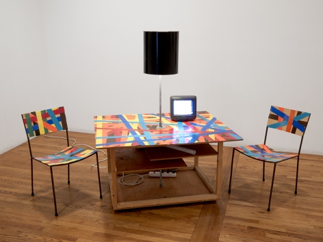 Franz West Creativity: Furniture Reversal, 1998 Two chairs, table, lamp, colored duct tape and video (which collapses into its own crate)