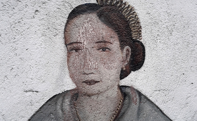 Detail of wall mural, painted portrait of a Filipina